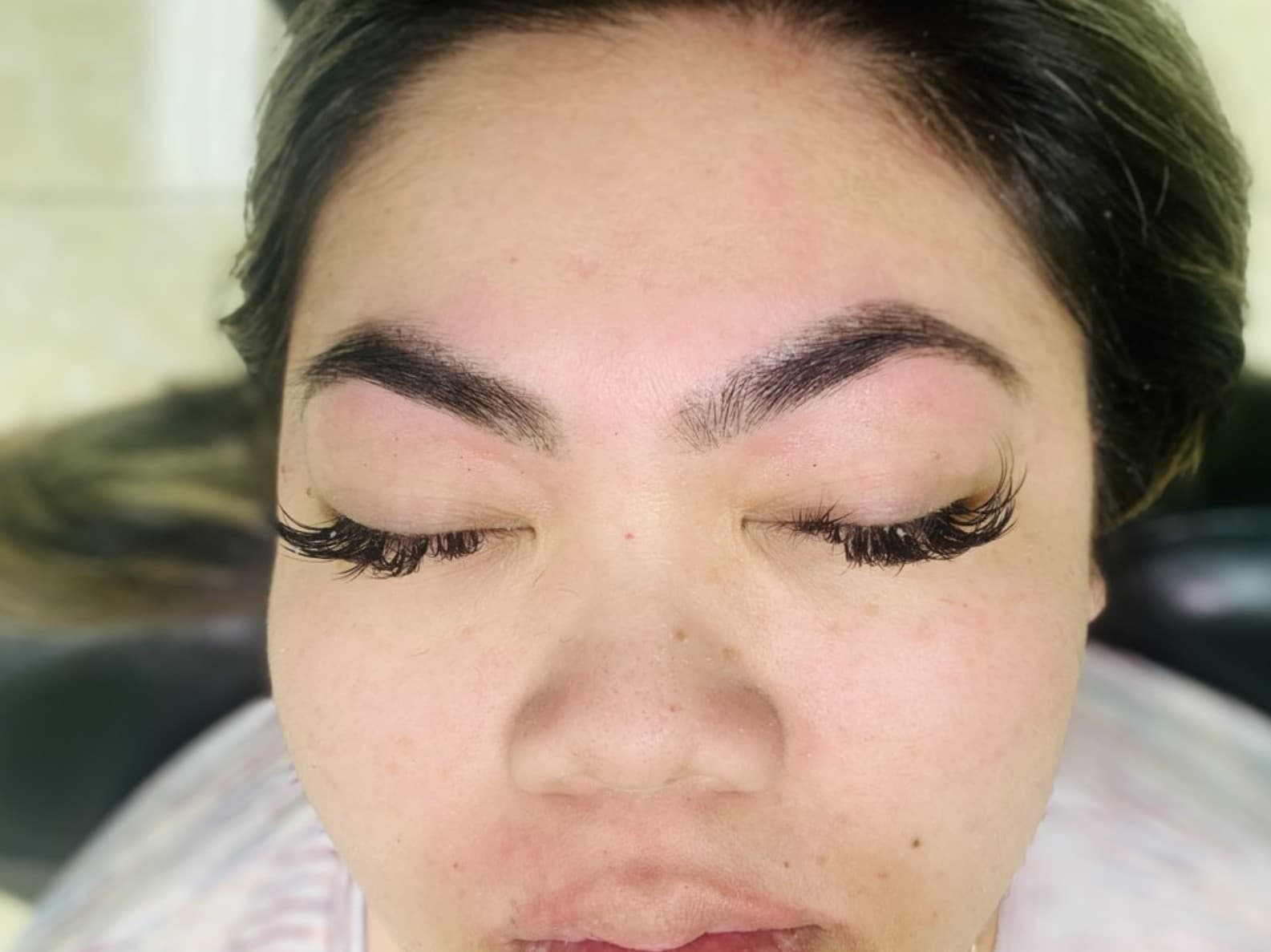 Brow threading close-up